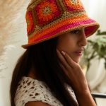 Knitted summer hat, patchwork of flowers, orange & fuchsia & beige